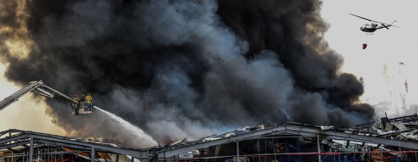 Fire in Beirut port damaged warehouse with food supplies / Day