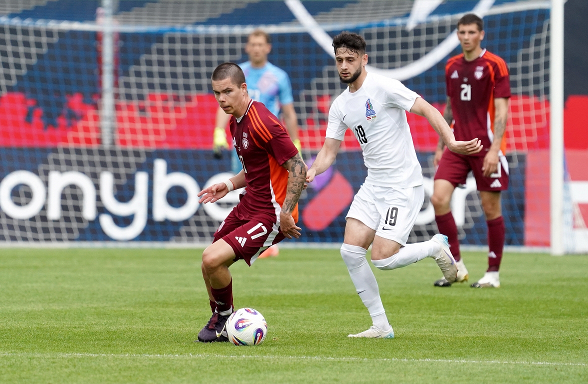 Latvian footballers in a test match with Azerbaijan’s tie / day